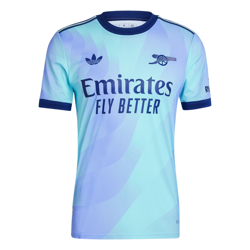 Arsenal 20242025 - Tercera camiseta Arsenal - Adidas Arsenal - Premier League - Copas Inglesas - Champions League - Diseño moderno - Detalles únicos - Londres - Azul marino - Amarillo - Blanco - Gola redonda - Escudo del Arsenal - Logo de Adidas - Historia del club - Identidad del club - Tecnologías innovadoras - Confort - Rendimiento.