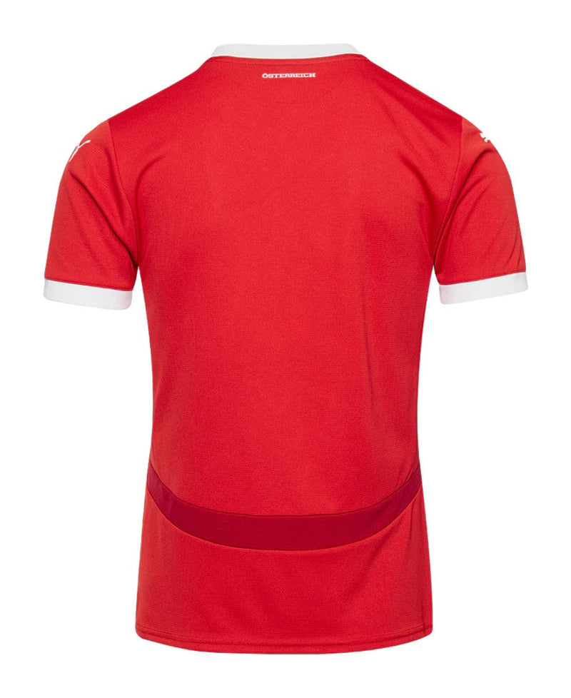 Austria 2024/2025 - Camiseta Austria - Uniforme titular Austria - Puma Austria - Diseño clásico - Rojo - Eurocopa - Nations League - Eliminatorias Copa del Mundo - Escudo nacional - Detalles estilizados - Gola redonda - Pantalones blancos - Calcetines rojos - Tradición - Identidad - Tecnologías innovadoras - Confort - Rendimiento.