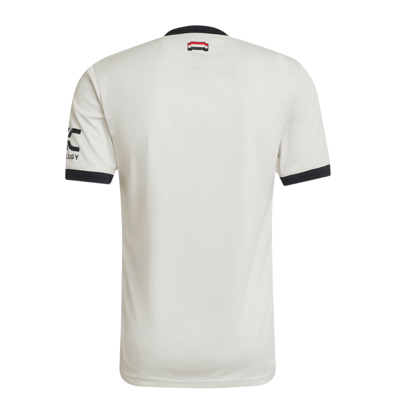 Manchester United 20242025 - Tercera camiseta Manchester United - Adidas Manchester United - Premier League - Copas Inglesas - Diseño moderno - Detalles únicos - Azul - Blanco - Plateado - Gola polo - Escudo del Manchester United - Logo de Adidas - Historia del club - Tecnologías innovadoras - Confort - Rendimiento