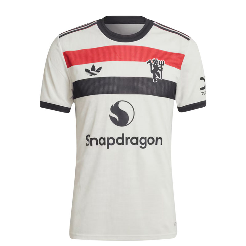 Manchester United 20242025 - Tercera camiseta Manchester United - Adidas Manchester United - Premier League - Copas Inglesas - Diseño moderno - Detalles únicos - Azul - Blanco - Plateado - Gola polo - Escudo del Manchester United - Logo de Adidas - Historia del club - Tecnologías innovadoras - Confort - Rendimiento