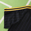 MANCHESTER UNITED ENTRANIMENTO 25/26 NEGRA HOMBRE (RETRO)