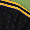 MANCHESTER UNITED ENTRANIMENTO 25/26 NEGRA HOMBRE (RETRO)