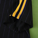 MANCHESTER UNITED ENTRANIMENTO 25/26 NEGRA HOMBRE (RETRO)