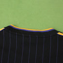 MANCHESTER UNITED ENTRANIMENTO 25/26 NEGRA HOMBRE (RETRO)